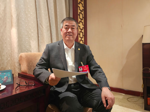 图为省政协委员袁小锋。（殷博华摄）(1418657)-20250116102406.jpg